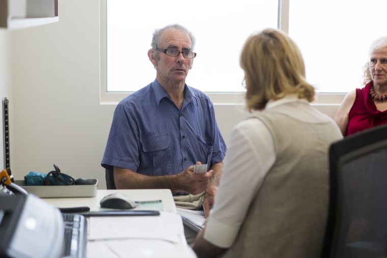 Older Australian consulting with their doctor
