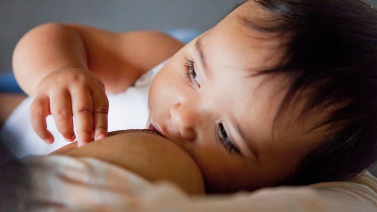 Mother breastfeeding a baby