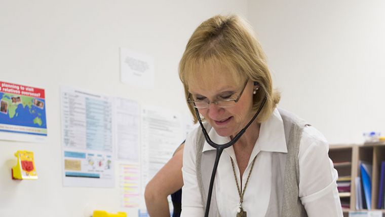 Health professional with stethoscope