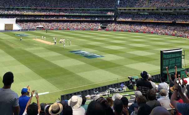 Image of a cricket ground with players