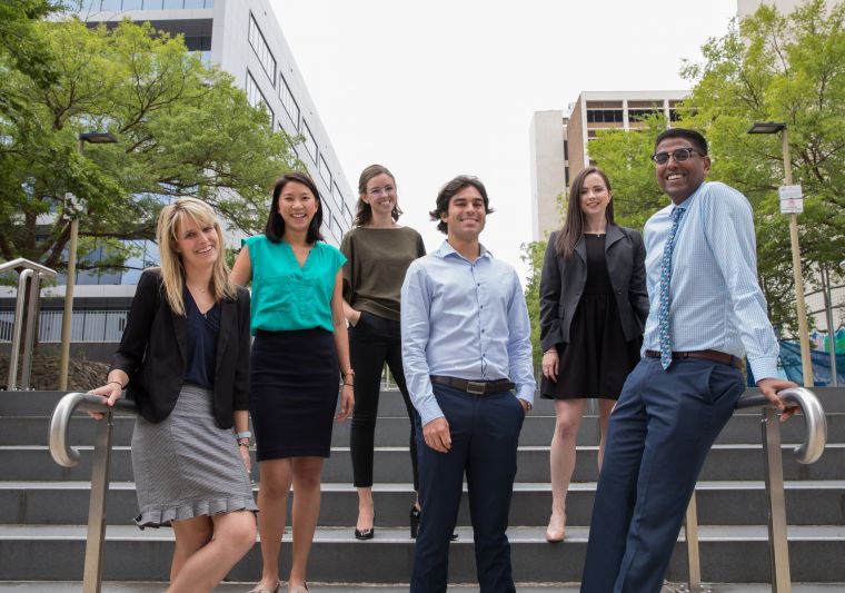 photos of health employees outside building