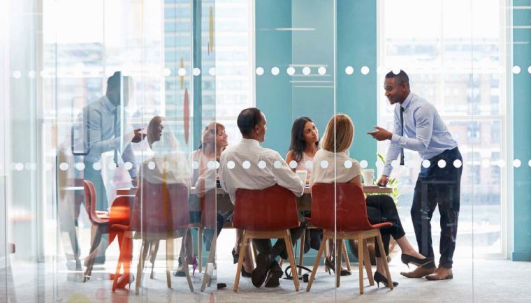 team discussing around a table