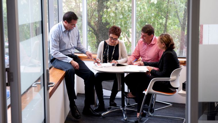 photo of people working together