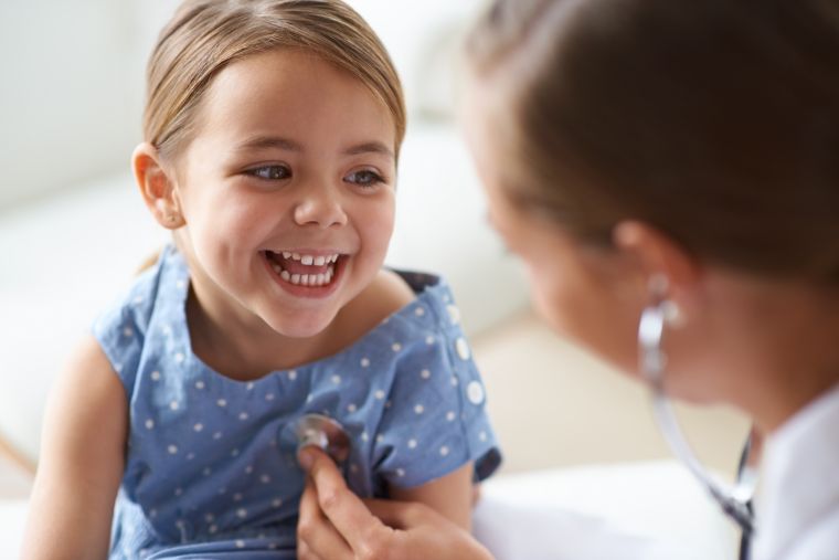Young girl with doctor