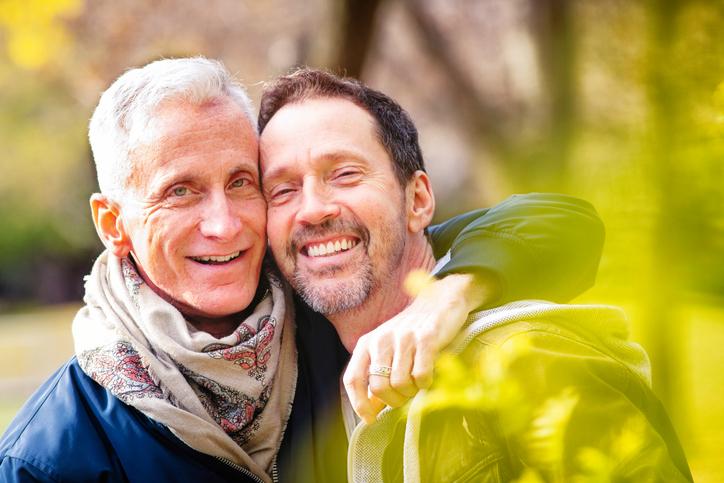 Two male images identifying the LGBTIQA+ communities
