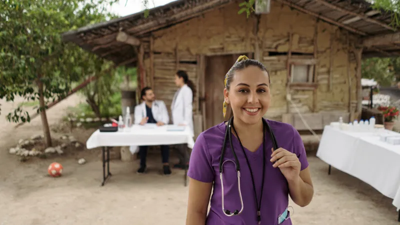 Nurse pictured in front of rural clinic