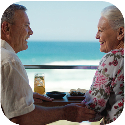 Image of a man and woman smiling.