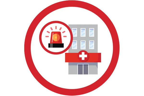 Flashing emergency light with a hospital building in the background