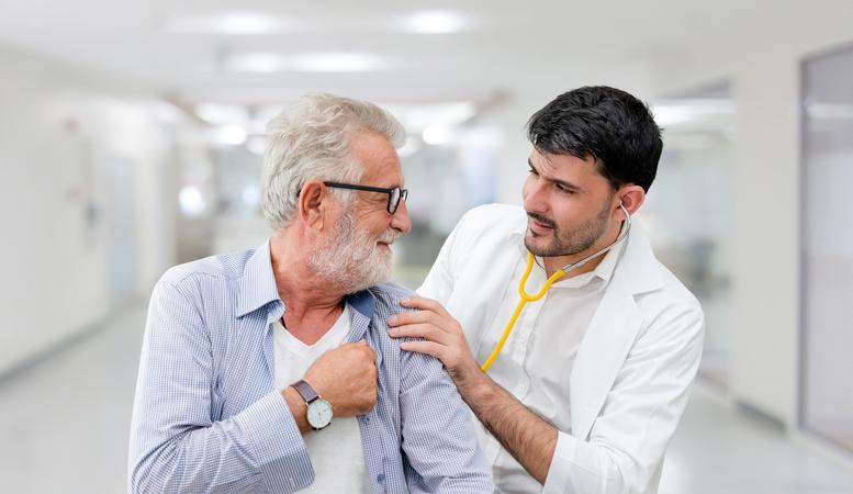 Photographic image of GP with a elderly patient