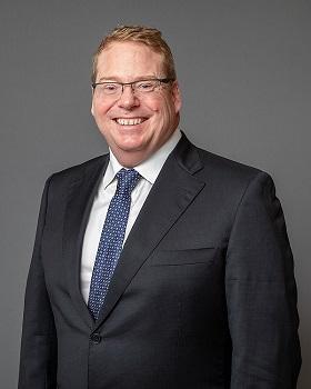 Secretary Blair Comley PSM