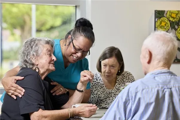 Photo of 3 aged care clients and a carer