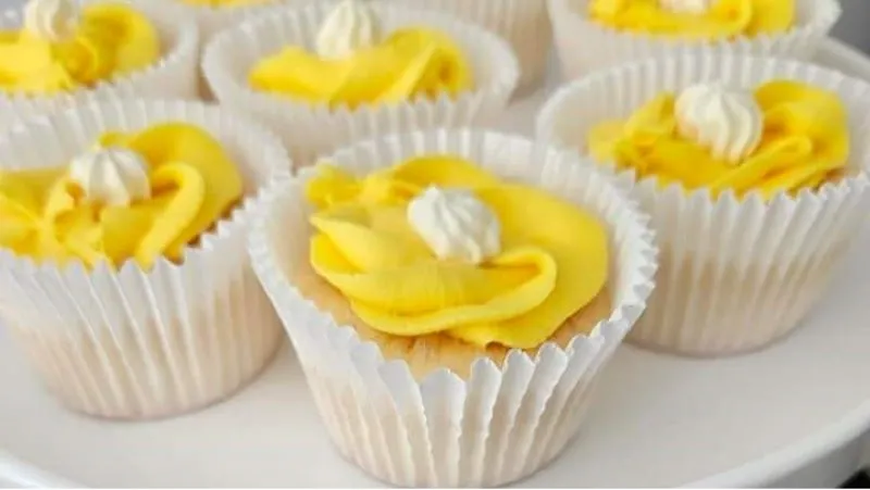 Close up of brigh cupcakes, as Heathcote Health’s Daffodil Day cupcakes on show in the dining room.