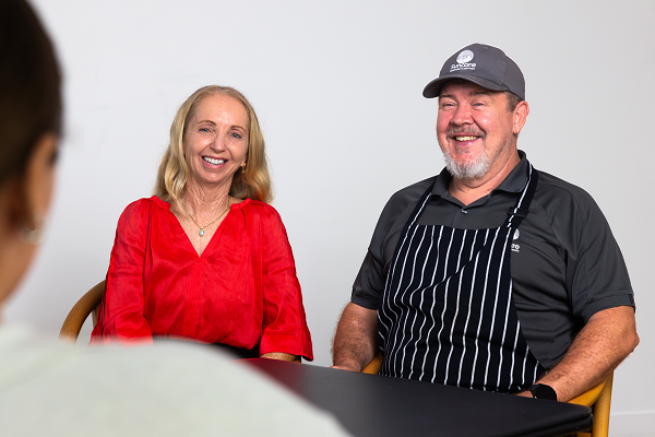 Caption: Aged care volunteer Debbie Orman (left) with Meals on Wheels volunteer Brett McRae (right)