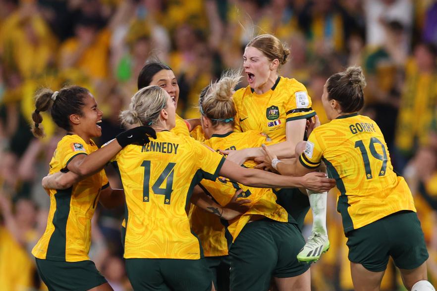 FIFA Women s World Cup 2023 females celebrating in a circle (Photo by Elsa -FIFA via Getty Images)