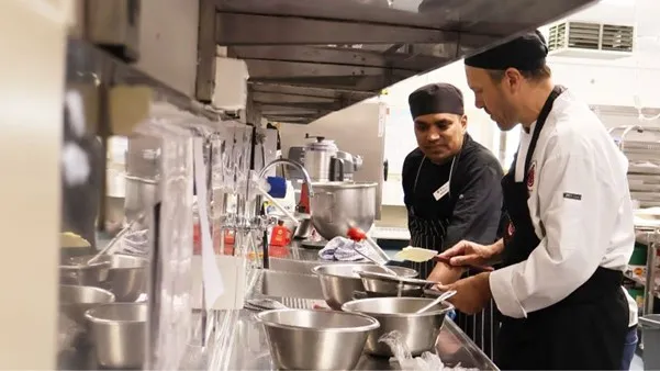 Nikesh (left) and chef trainer Ben Lewis (right)