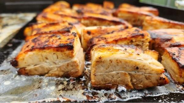 Overnight pork belly served at a BBQ