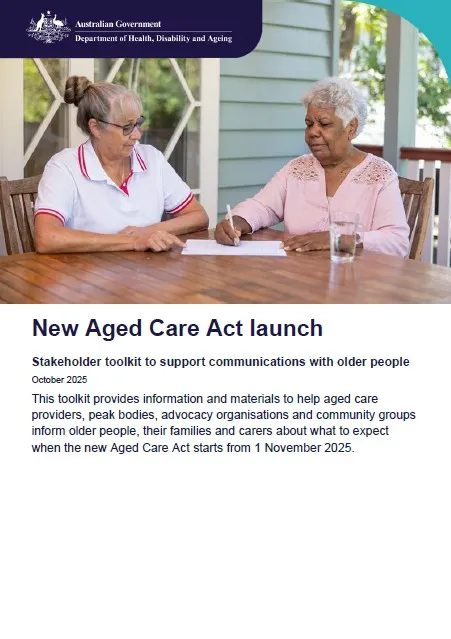 Display image. An aged care worker talking to an older person. 