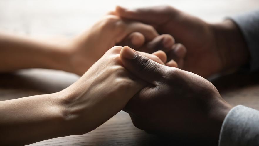 Couple holding hands