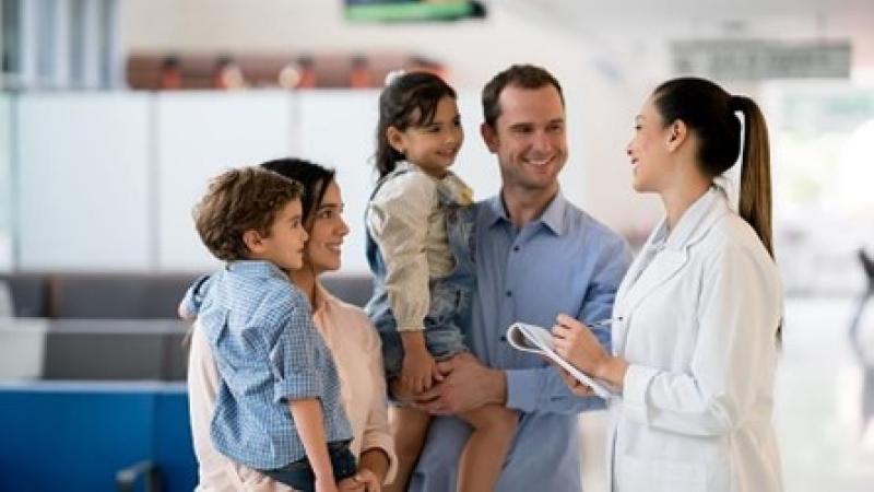 Image of doctor with a family
