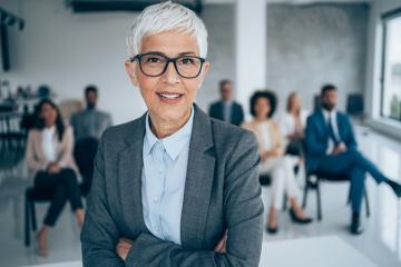 MRFF news image of a lady standing in a business suit