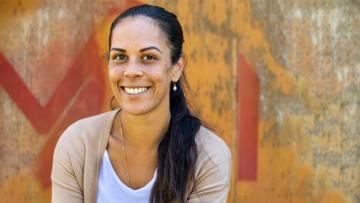 Cover image on Indigenous woman smiling and looking at the camera