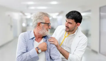 Photographic image of GP with a elderly patient