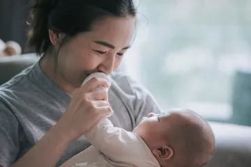 Photograph image of mother with infant