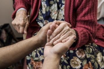 Two hands holding