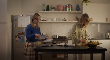 Video still of 2 women in a kitchen