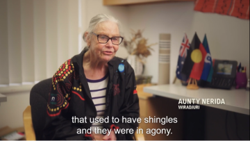 Elderly lady in chair being interviewed about her experience as a nurse and having patients with shingles