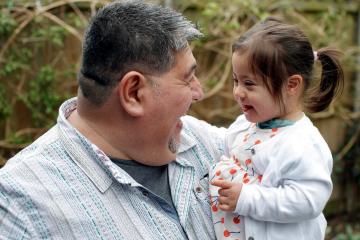 Photo of a Father with his daughter