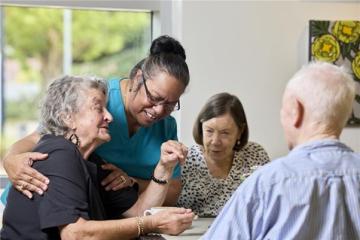 Photo of 3 aged care clients and a carer