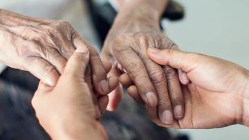 Two hands being held