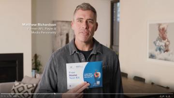 Matthew Richardson [Former AFL Player and Media Personality] holding Bowel cancer kit