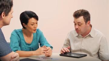 Female doctor and male patient making a decision together