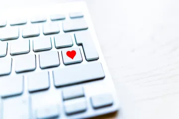 Keyboard with a heart icon on one key