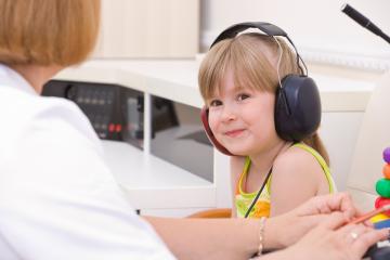 Young girl having a hearing test