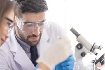 Image of male doctor with health and scientific icons