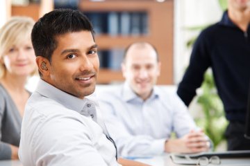 image of employees in an office