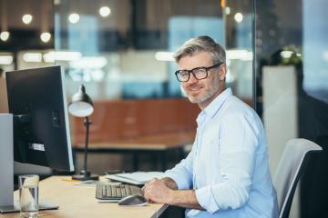 Man sitting in front of a computer