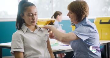 Image of girl and nurse providing vaccination