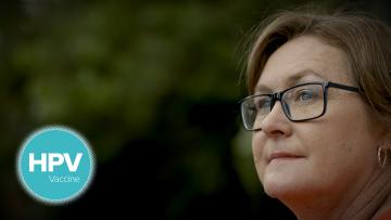Image of a woman looking into the distance