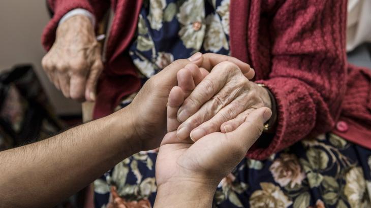 Two hands holding