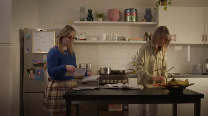 Video still of 2 women in a kitchen