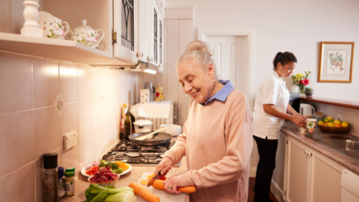 Elderly female at home in her kitchen