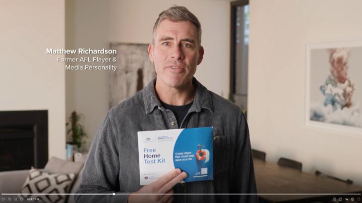 Matthew Richardson [Former AFL Player and Media Personality] holding Bowel cancer kit