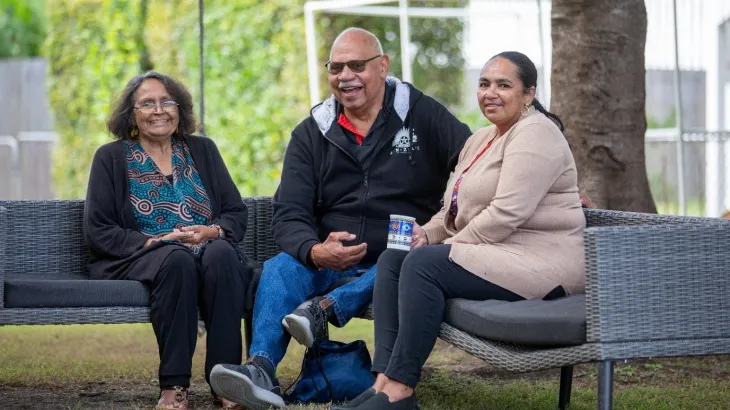 Photo of elderly first nations couple and their carer