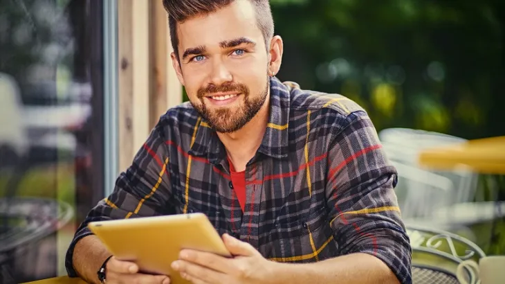 Young Male with iPad