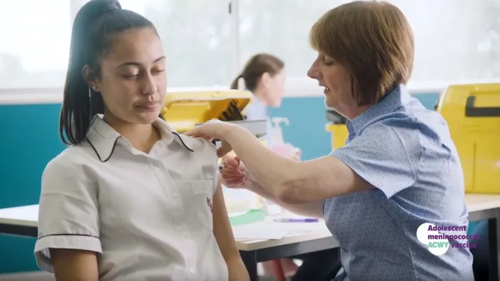 Image of girl and nurse providing vaccination