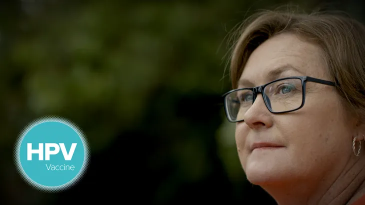 Image of a woman looking into the distance